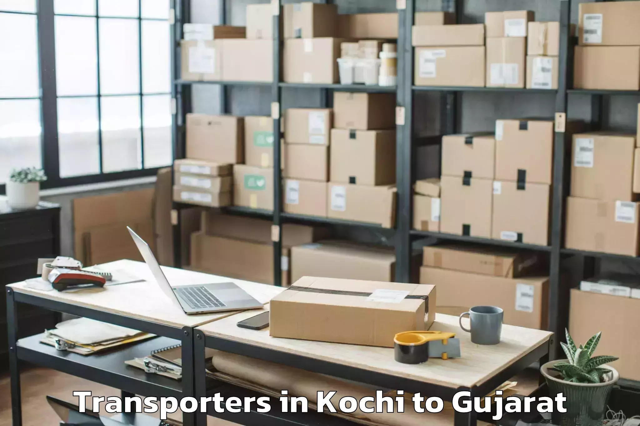 Book Kochi to Garbada Transporters